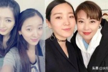 兴化7旬奶奶带盲老伴游遍中国(小女孩扶盲人老奶奶过马路)